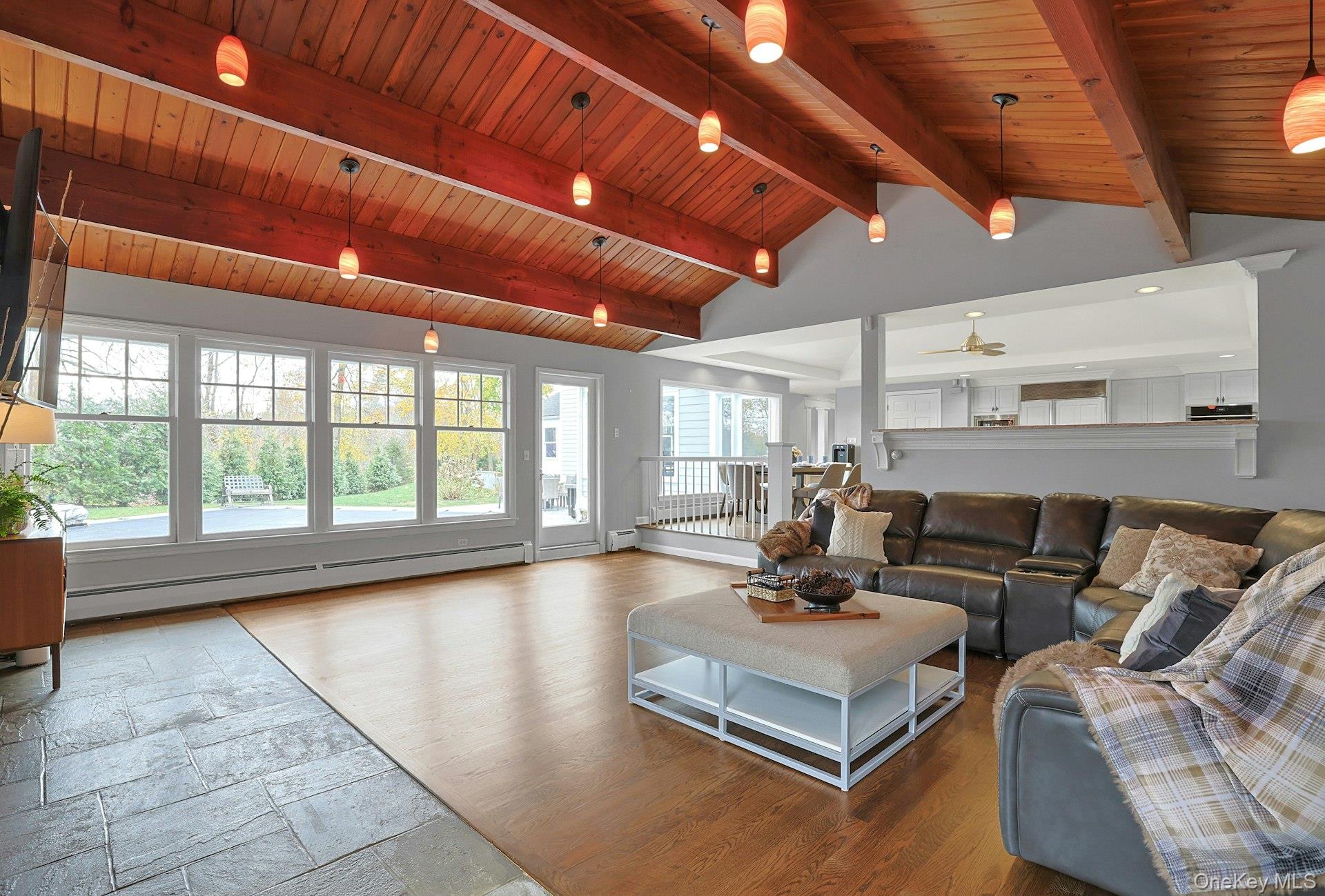 8 Creemer Road Armonk, NY 10504 - Photo 6 of 38 a living room with furniture and large windows