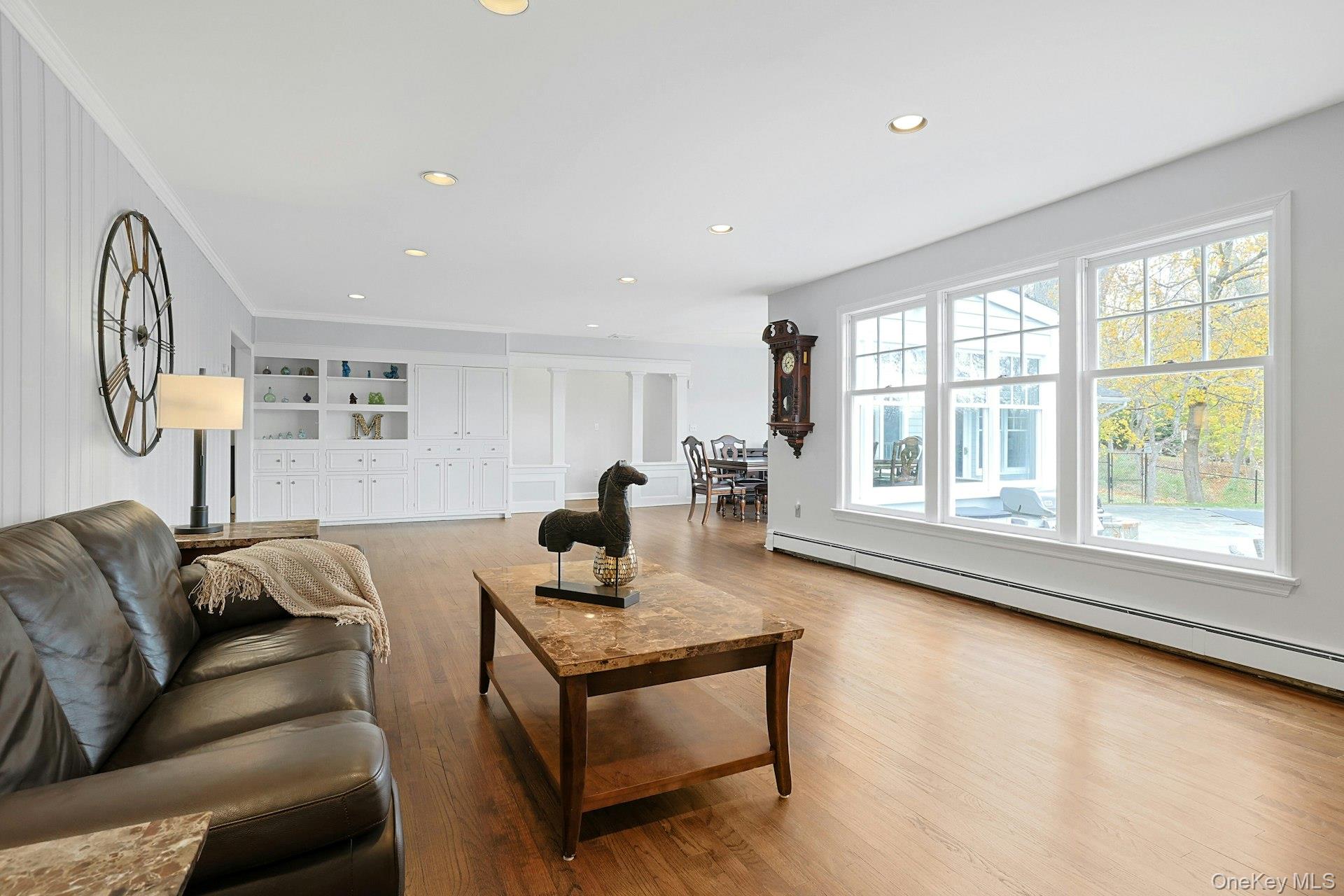 8 Creemer Road Armonk, NY 10504 - Photo 9 of 38 a living room with furniture and a window