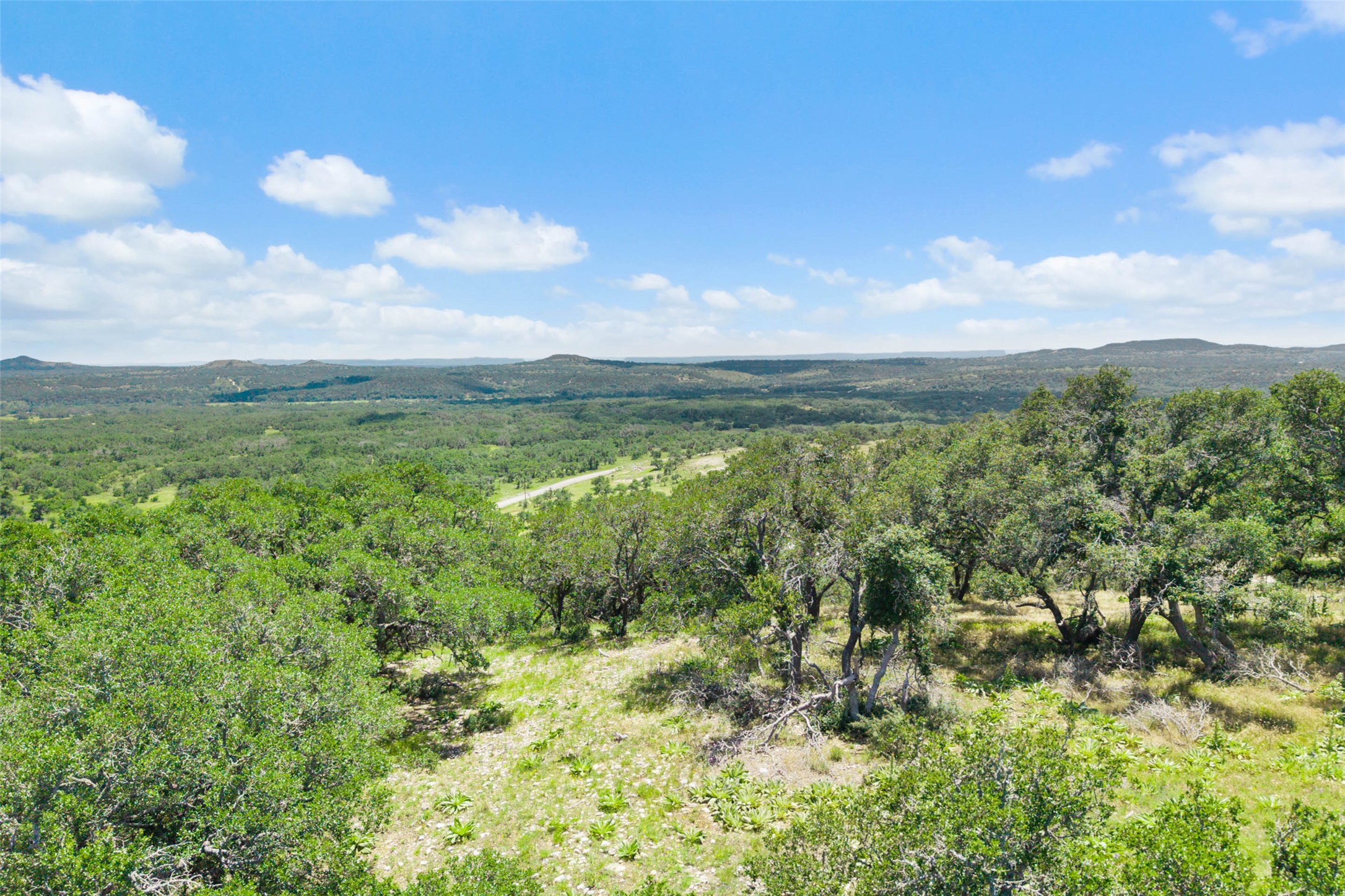 5032 Kendalia Road Blanco, TX 78606 - Photo 11 of 40 a view of a city and mountains