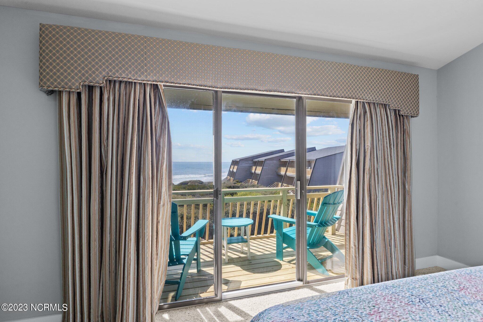 545 Salter Path Road, Unit L5 Pine Knoll Shores, NC 28512 - Photo 18 of 54 Wake up to the beautiful ocean views in the Owner's Suite