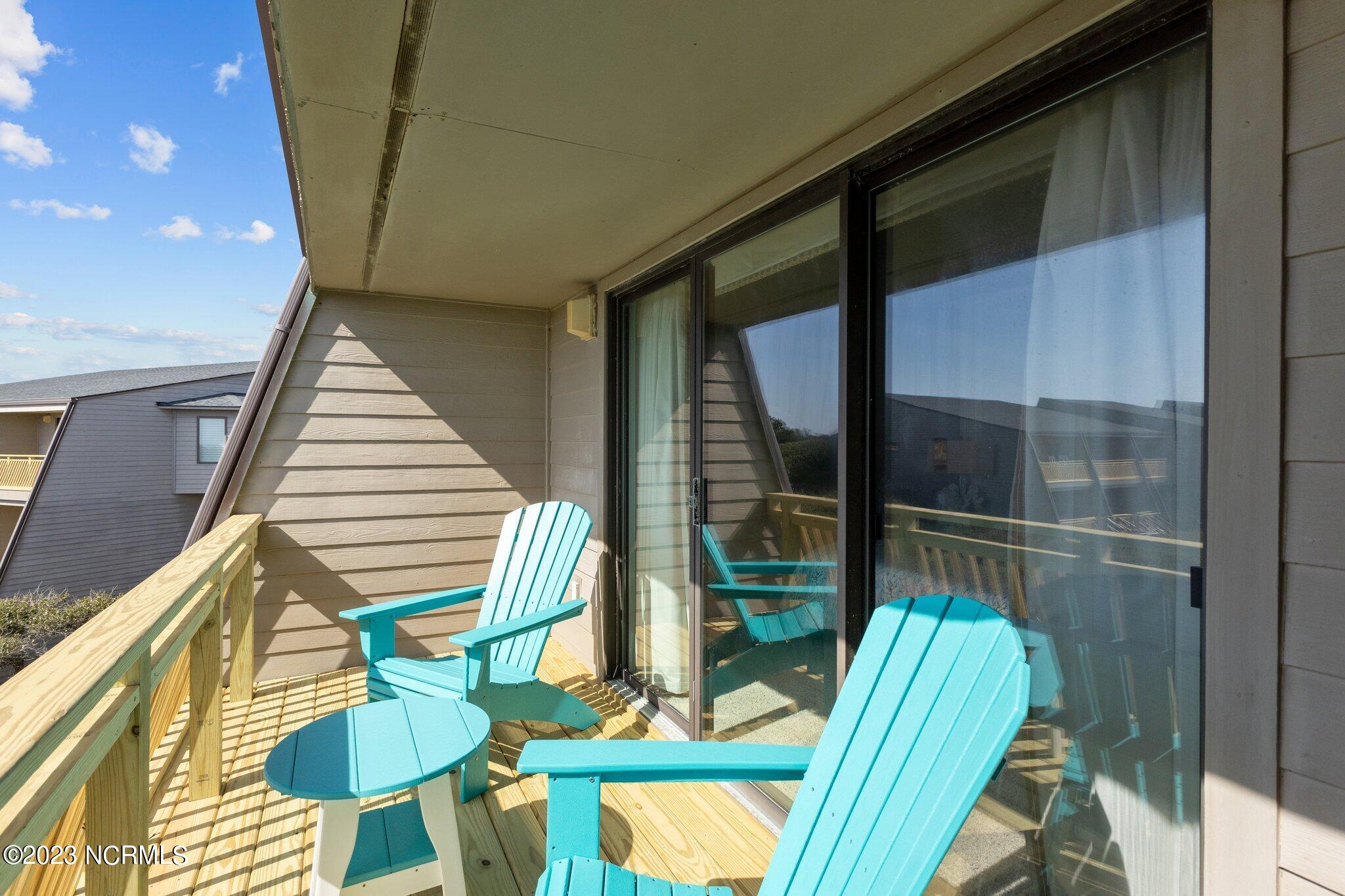 545 Salter Path Road, Unit L5 Pine Knoll Shores, NC 28512 - Photo 19 of 54 Covered balcony off owner's suite