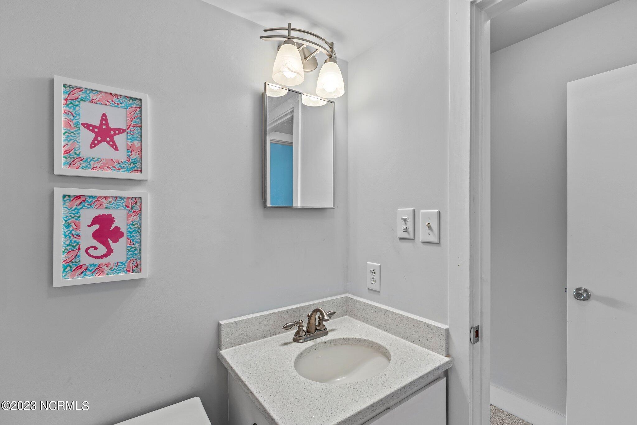 545 Salter Path Road, Unit L5 Pine Knoll Shores, NC 28512 - Photo 28 of 54 2nd Floor bath with quartz countertop