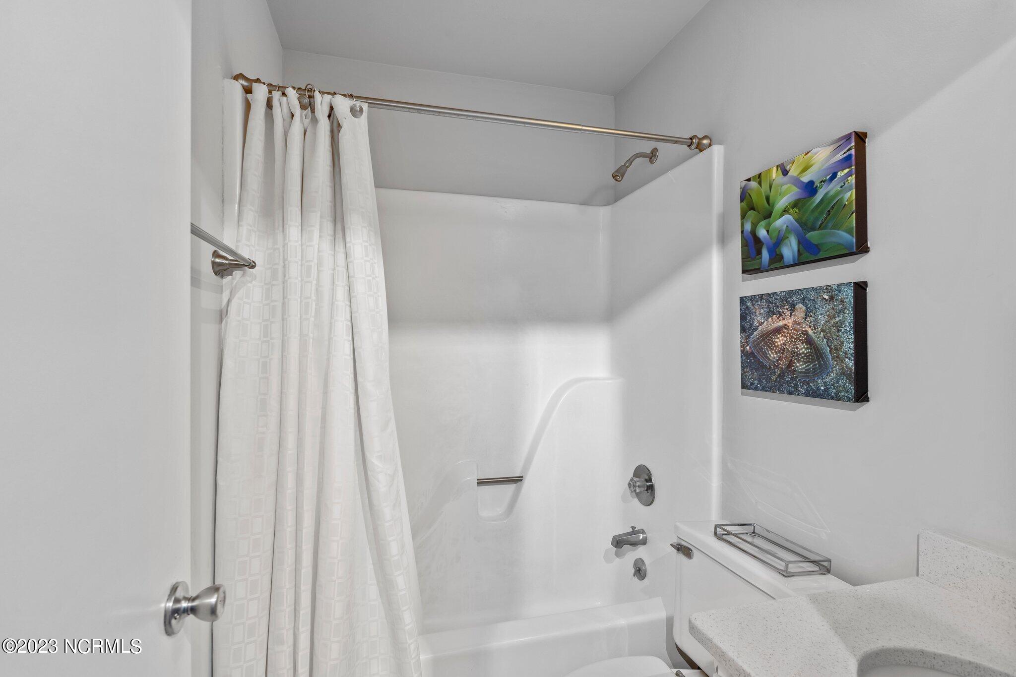 545 Salter Path Road, Unit L5 Pine Knoll Shores, NC 28512 - Photo 33 of 54 Shower in downstairs full bath