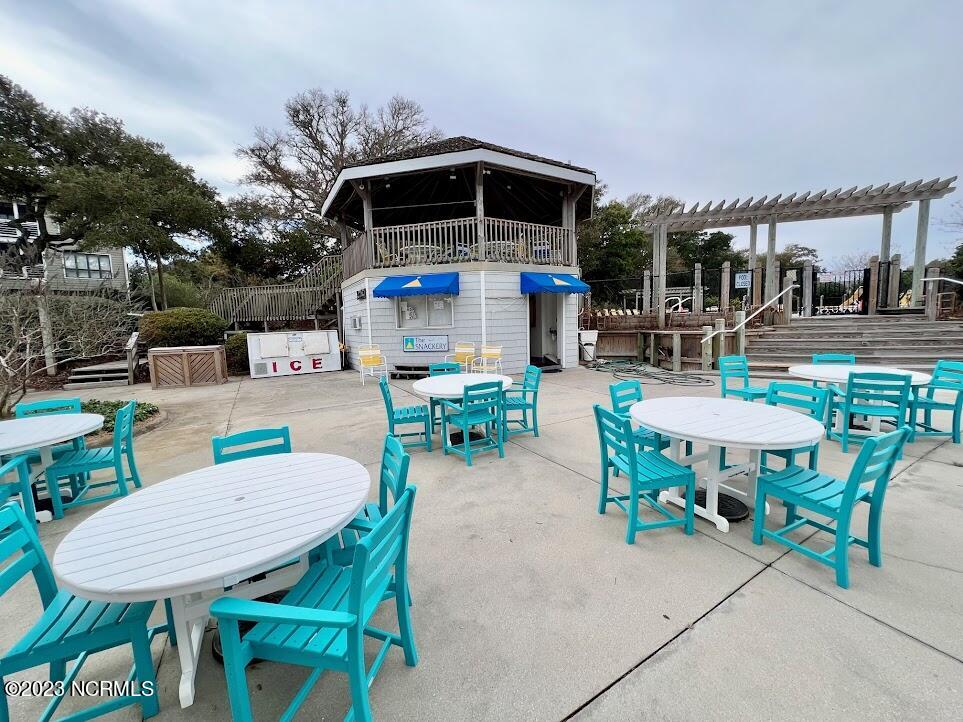 545 Salter Path Road, Unit L5 Pine Knoll Shores, NC 28512 - Photo 46 of 54 Sitting area by marina pool