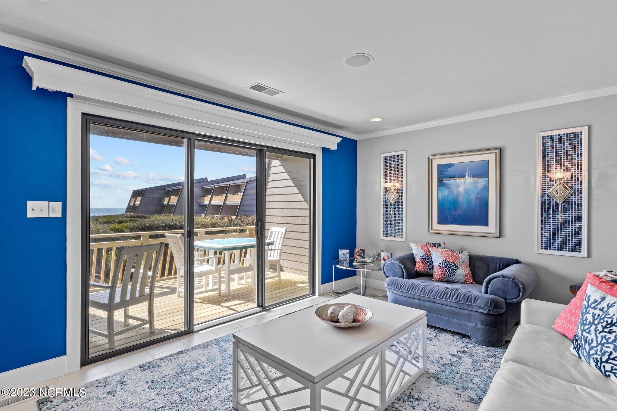 545 Salter Path Road, Unit L5 Pine Knoll Shores, NC 28512 - Photo 8 of 54 Enjoy the ocean views from outside or inside