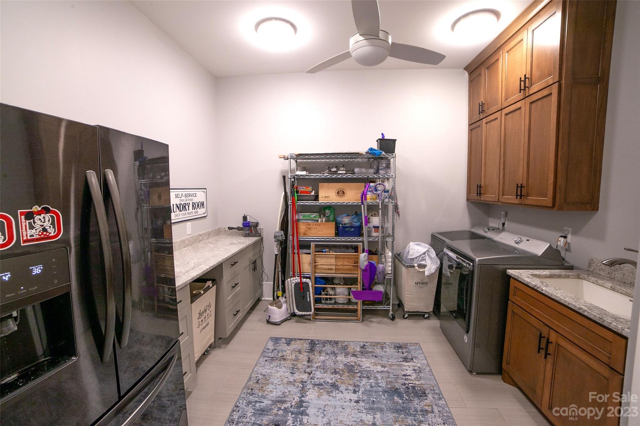 169 Thomas Road Clover, SC 29710 - Photo 29 of 47 a kitchen with refrigerator and cabinets