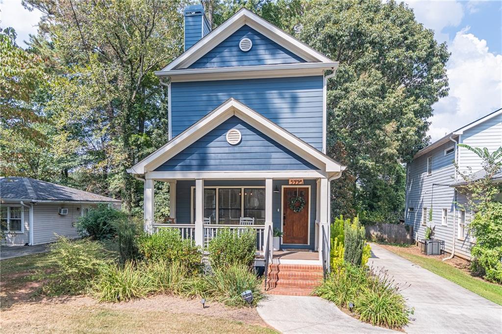 2770 Amelia Avenue Decatur, GA 30032 - Photo 1 of 1 a front view of a house with a yard