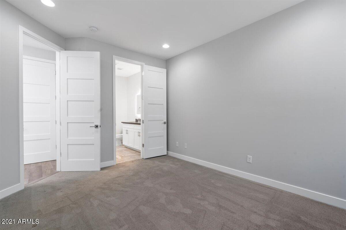 1214 West 5th Street, Unit 2 Tempe, AZ 85281 - Photo 12 of 26 an empty room with closet area