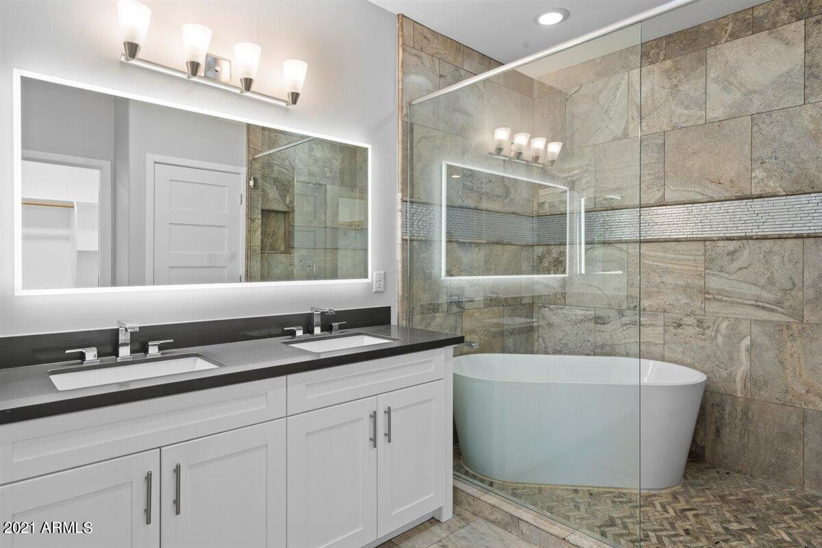 1214 West 5th Street, Unit 2 Tempe, AZ 85281 - Photo 23 of 26 a bathroom with a bathtub and double sink