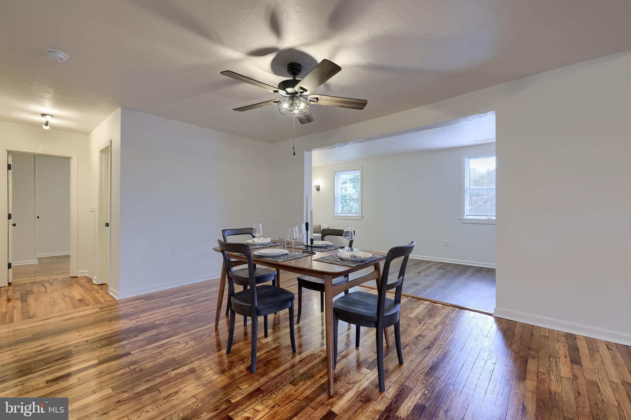 643 Franklin Street Columbia, PA 17512 - Photo 16 of 46 a view of a dining room with furniture and wooden floor