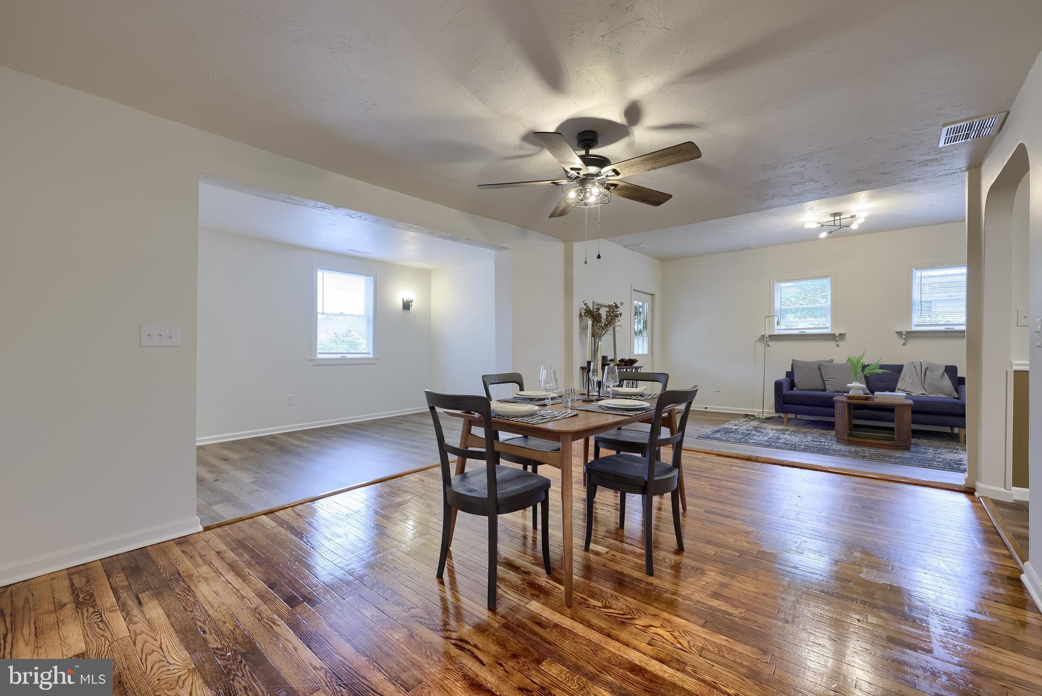 643 Franklin Street Columbia, PA 17512 - Photo 19 of 46 a view of a dining room with furniture and wooden floor