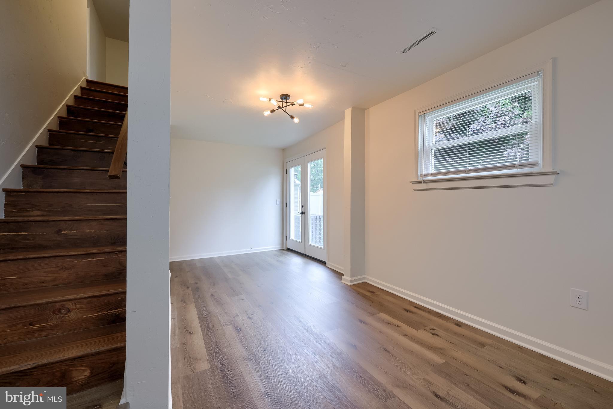 643 Franklin Street Columbia, PA 17512 - Photo 32 of 46 wooden floor in an empty room with a window