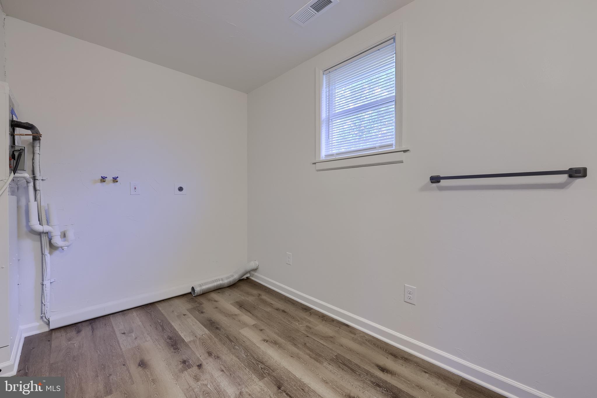 643 Franklin Street Columbia, PA 17512 - Photo 34 of 46 a view of a small space with wooden floor and a window