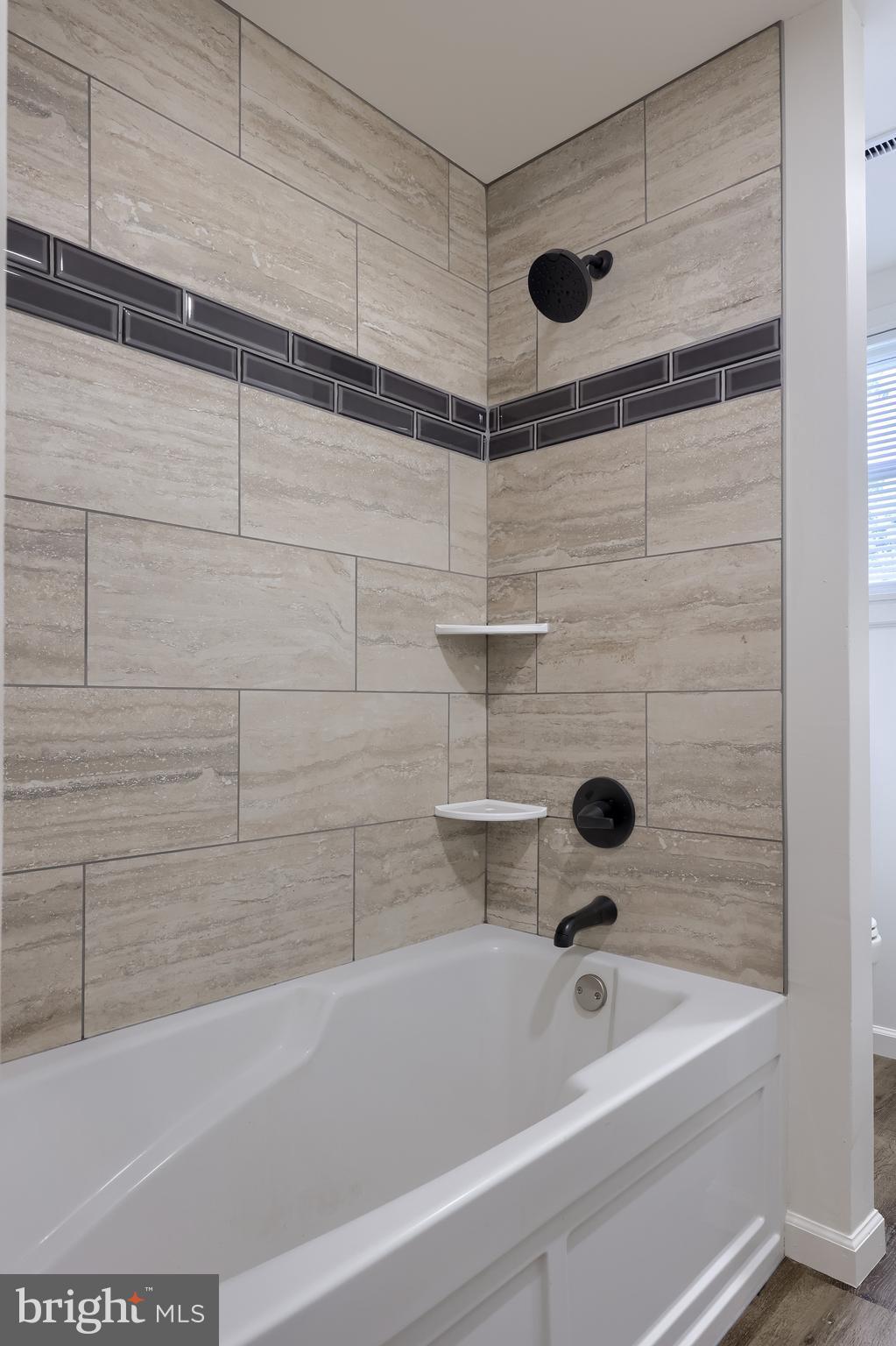 643 Franklin Street Columbia, PA 17512 - Photo 41 of 46 a bathroom with a bathtub and shower