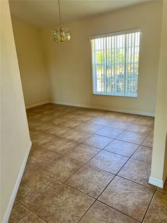 en empty room with windows