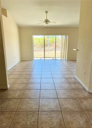 a view of an empty room and window