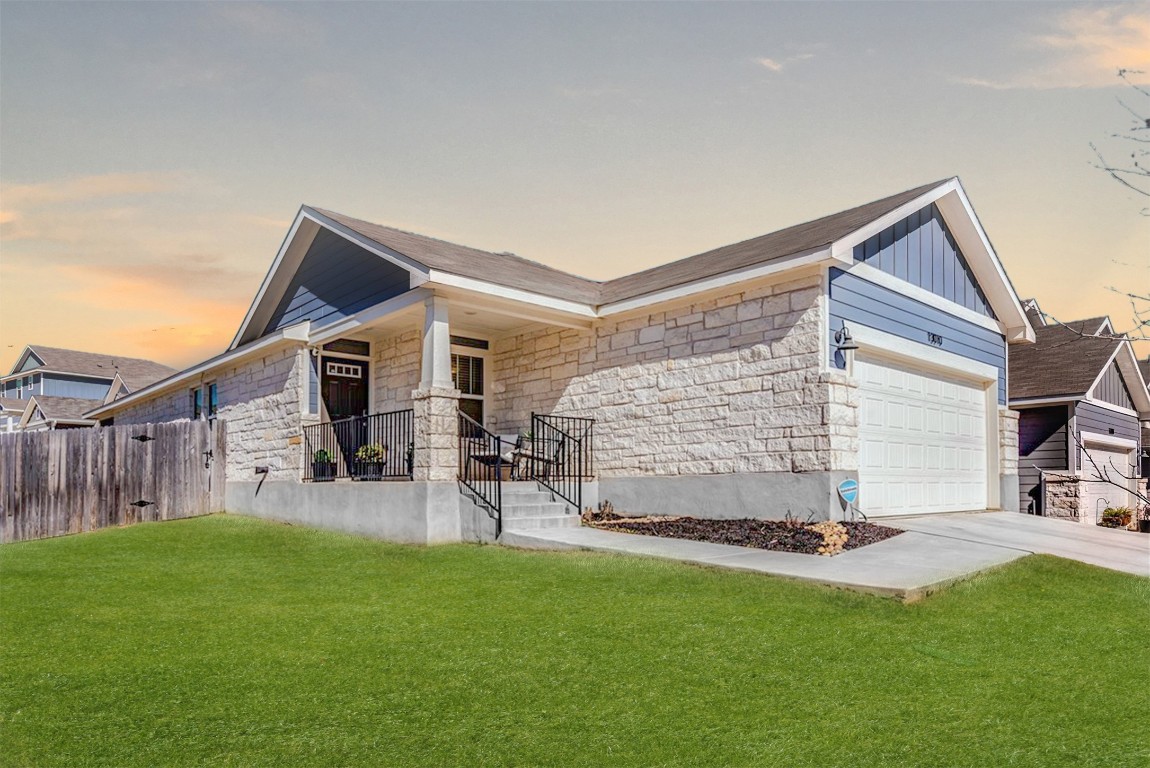 13010 Barrister Lane Buda, TX 78610 - Photo 1 of 1 a view of a house with a yard and sitting area