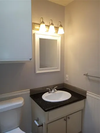 a bathroom with a sink and a toilet