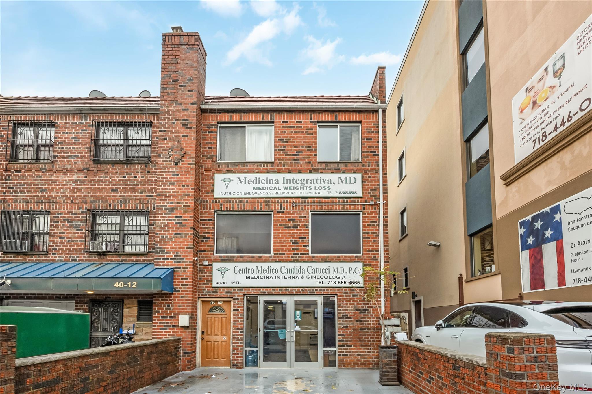 a front view of a building with multiple windows