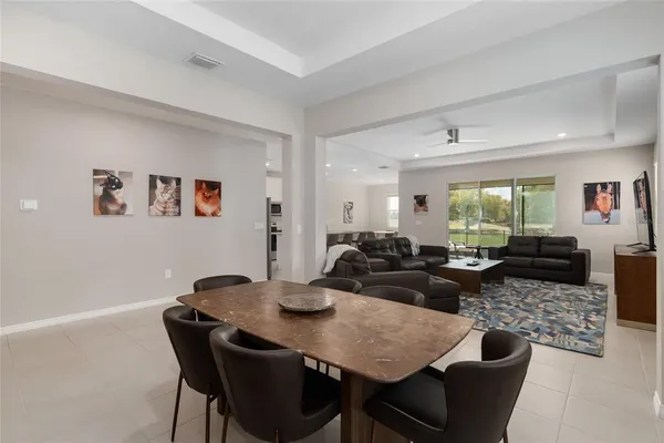 a bathroom with a tub sink shower and mirror