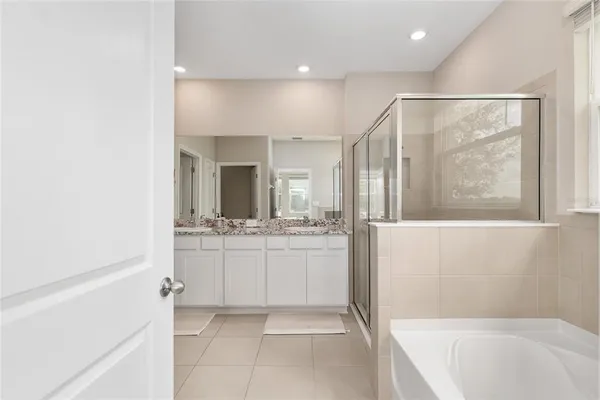 a bedroom with a bed and a cabinets