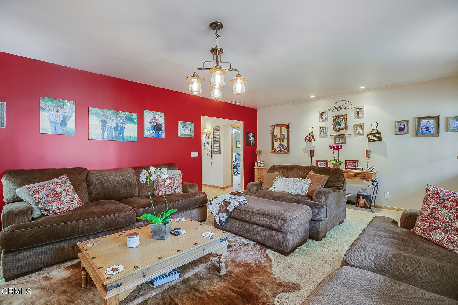 9972 Creek Road Oak View, CA 93022 - Photo 12 of 50 a living room with furniture and a chandelier