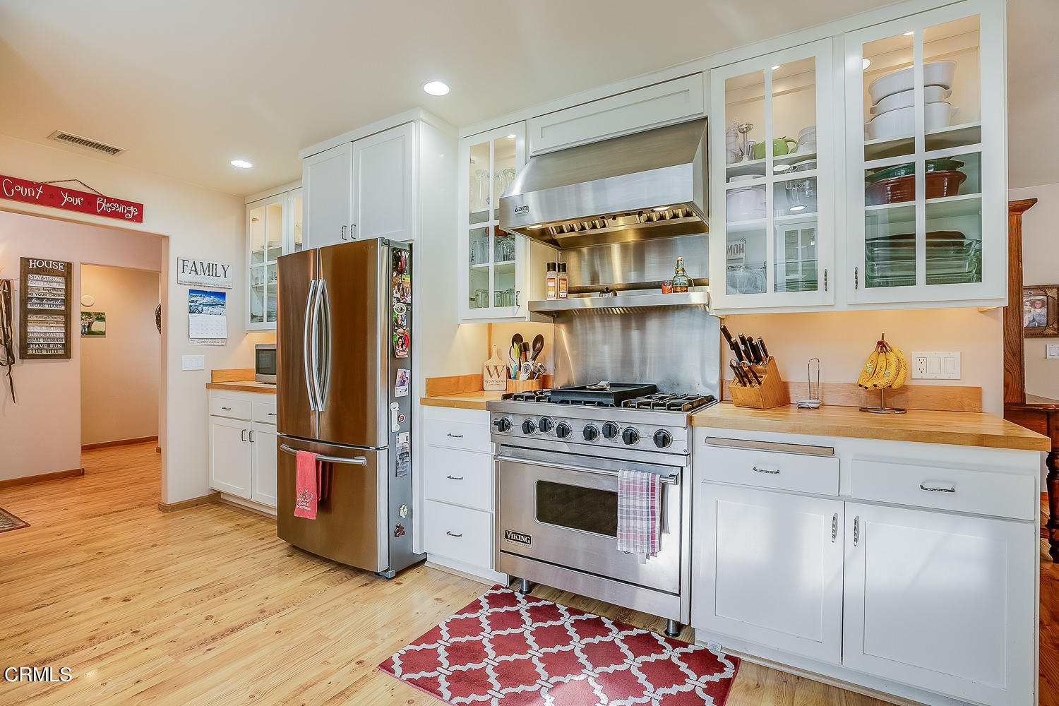 9972 Creek Road Oak View, CA 93022 - Photo 15 of 50 a kitchen with stainless steel appliances granite countertop a refrigerator a stove and a sink