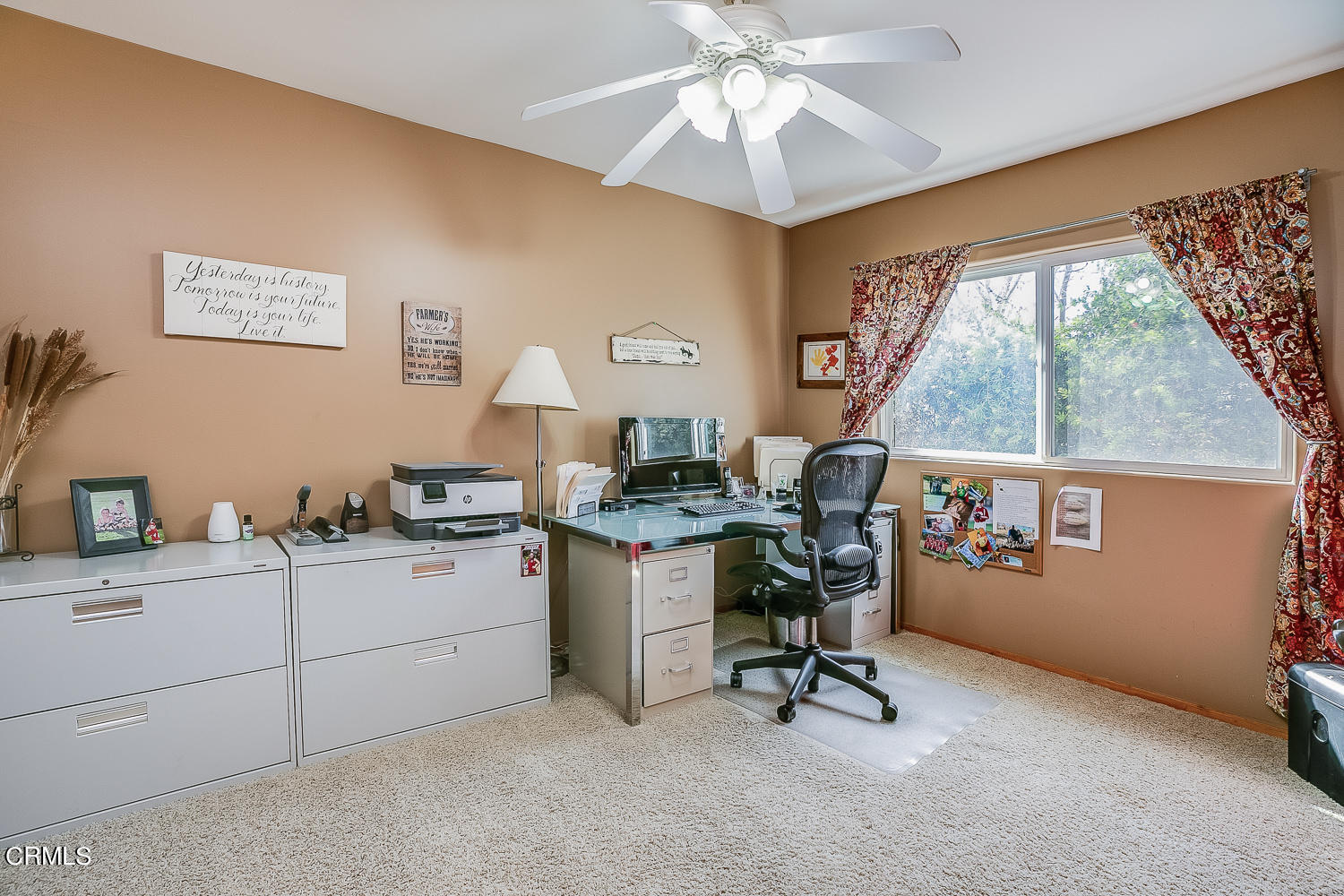 9972 Creek Road Oak View, CA 93022 - Photo 17 of 50 a workspace with wooden floor and a window