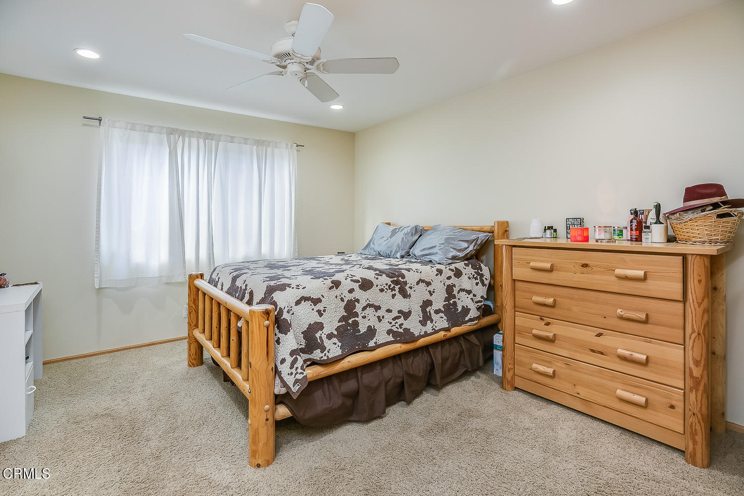 9972 Creek Road Oak View, CA 93022 - Photo 21 of 50 a bed sitting in a bedroom and dresser