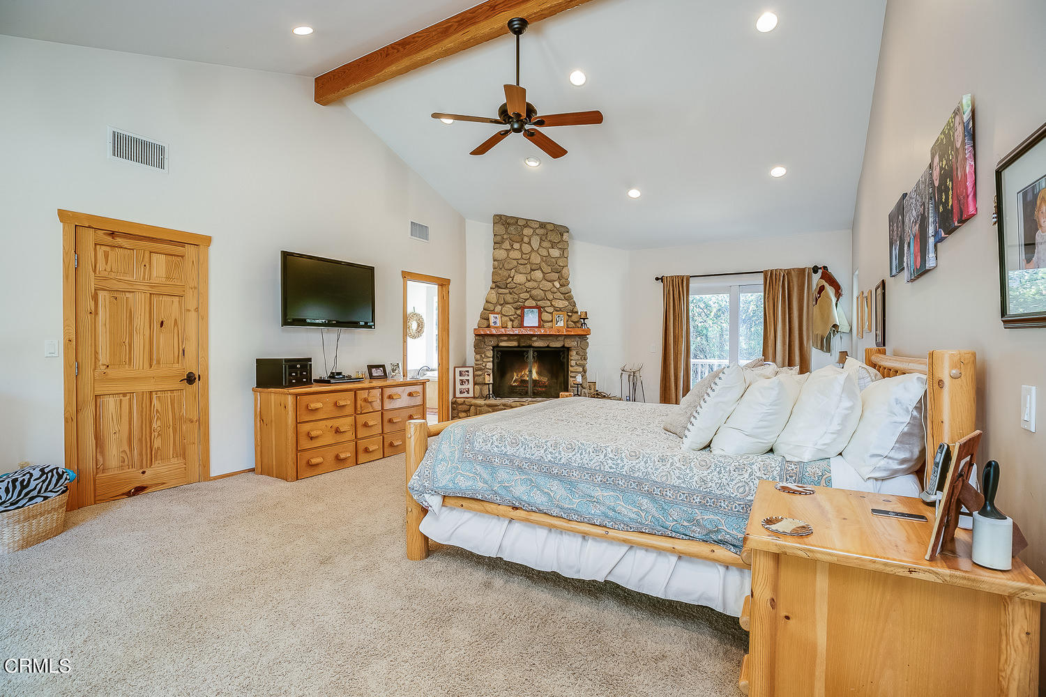 9972 Creek Road Oak View, CA 93022 - Photo 25 of 50 a bed room with furniture and a flat screen tv