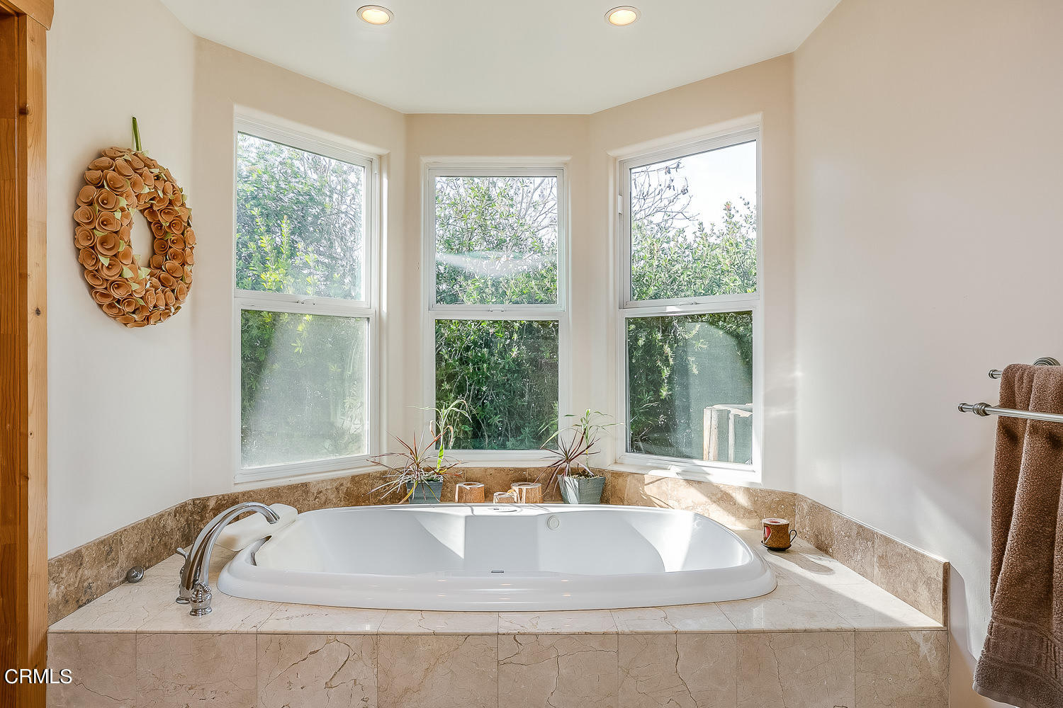 9972 Creek Road Oak View, CA 93022 - Photo 28 of 50 a bathroom with a tub and window