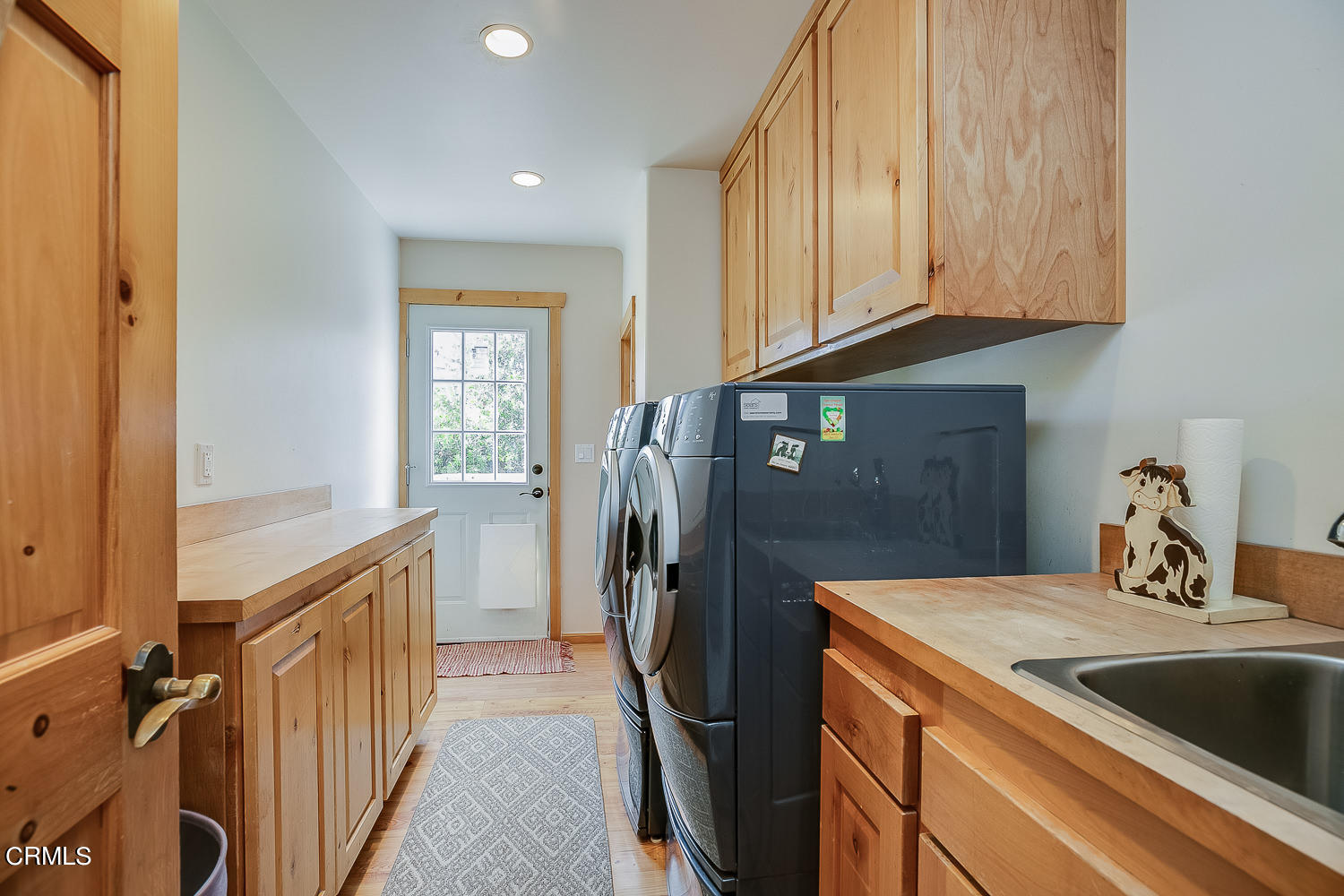 9972 Creek Road Oak View, CA 93022 - Photo 31 of 50 a kitchen with stainless steel appliances granite countertop a refrigerator and a sink