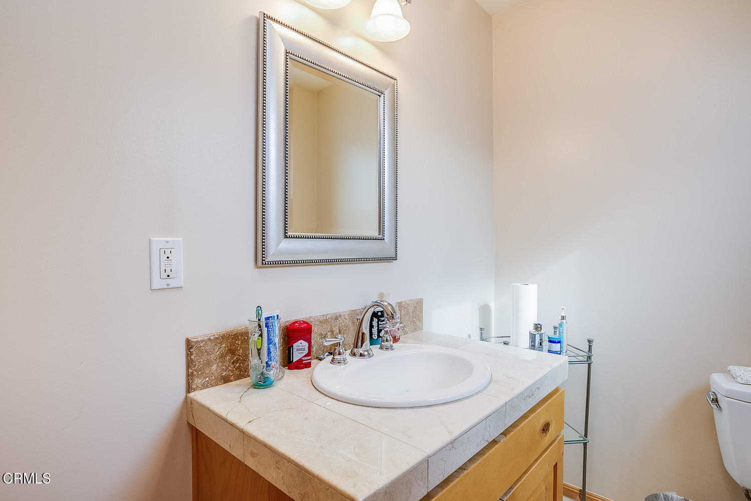 9972 Creek Road Oak View, CA 93022 - Photo 35 of 50 a bathroom with a sink vanity and a toilet