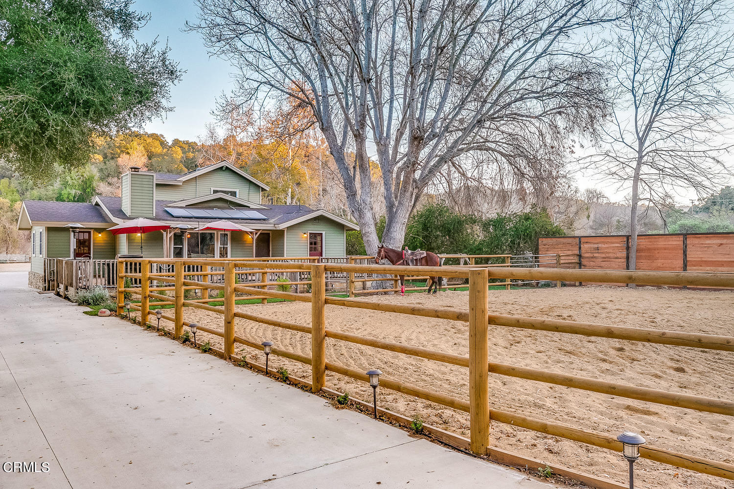 9972 Creek Road Oak View, CA 93022 - Photo 5 of 50 a view of a house with wooden fence