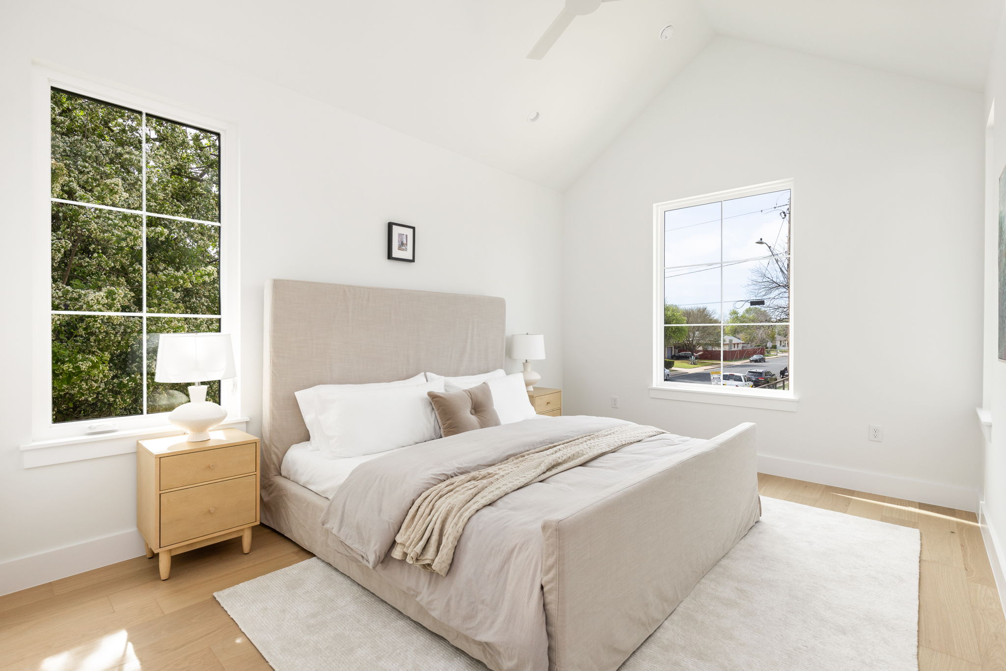 2910 East 4th Street Austin, TX 78702 - Photo 21 of 39 a bedroom with a bed and a window with outer view