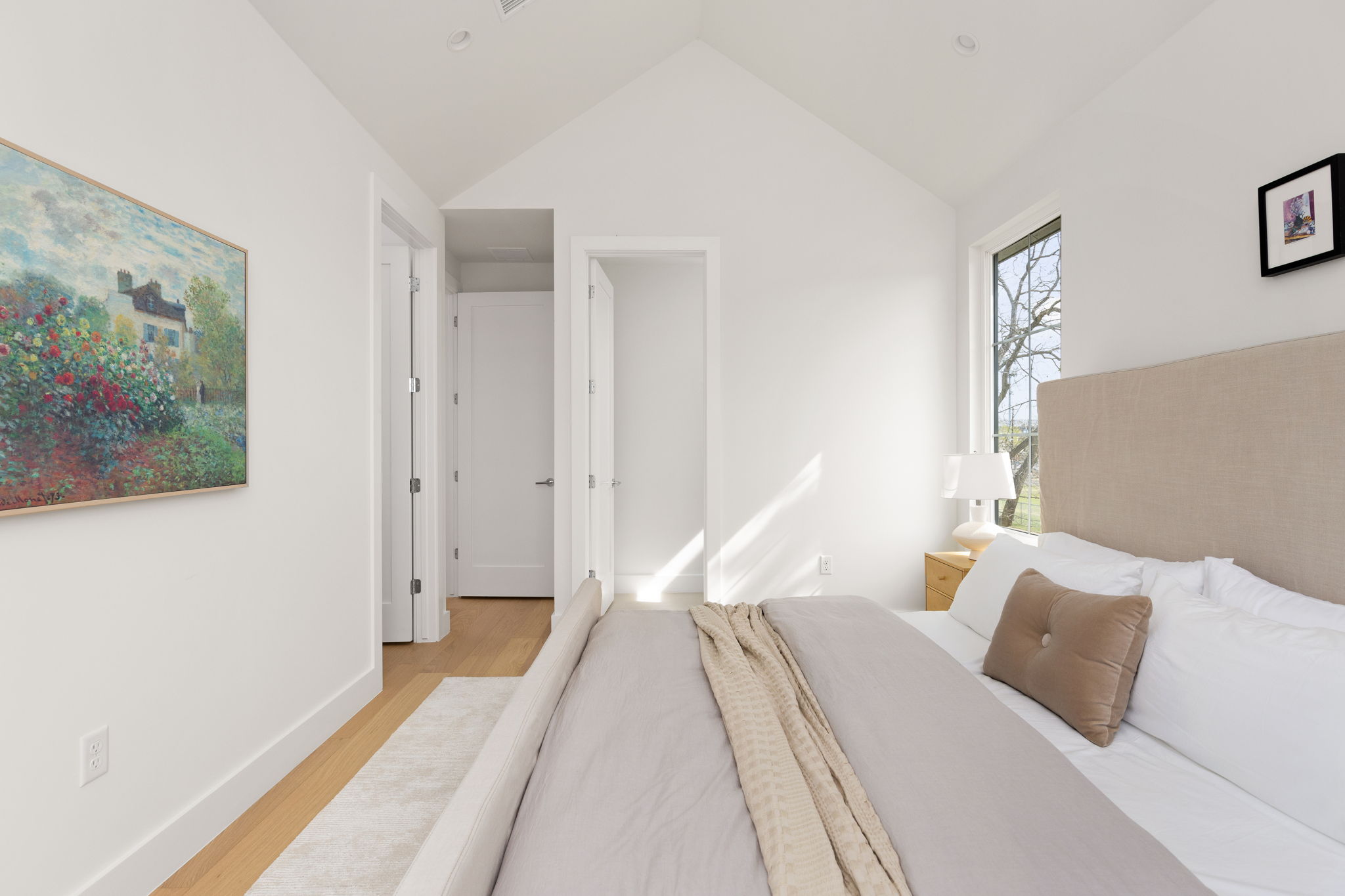 2910 East 4th Street Austin, TX 78702 - Photo 22 of 39 a bed room with a bed and a painting