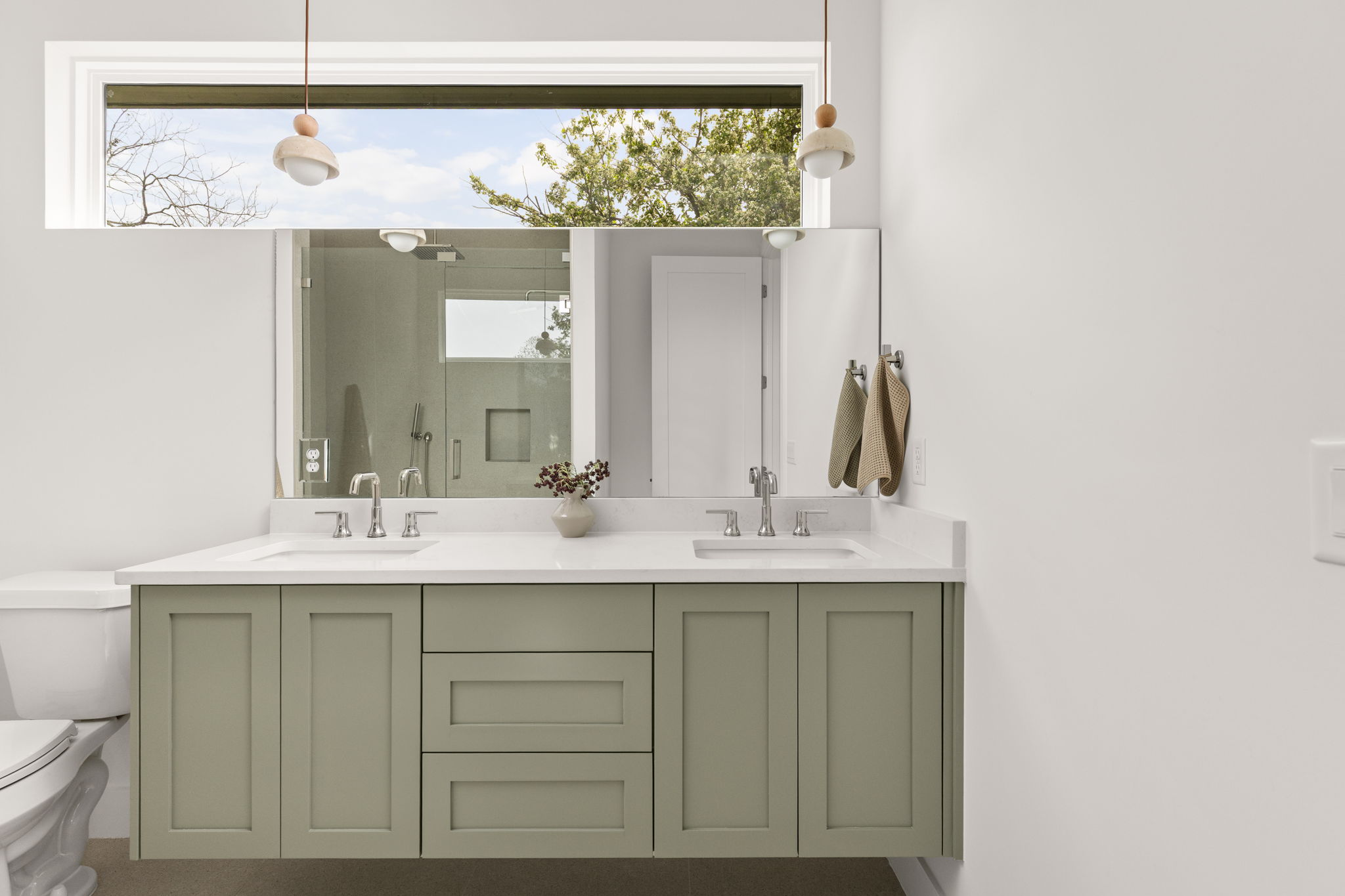 2910 East 4th Street Austin, TX 78702 - Photo 23 of 39 a bathroom with a double vanity sink and a mirror