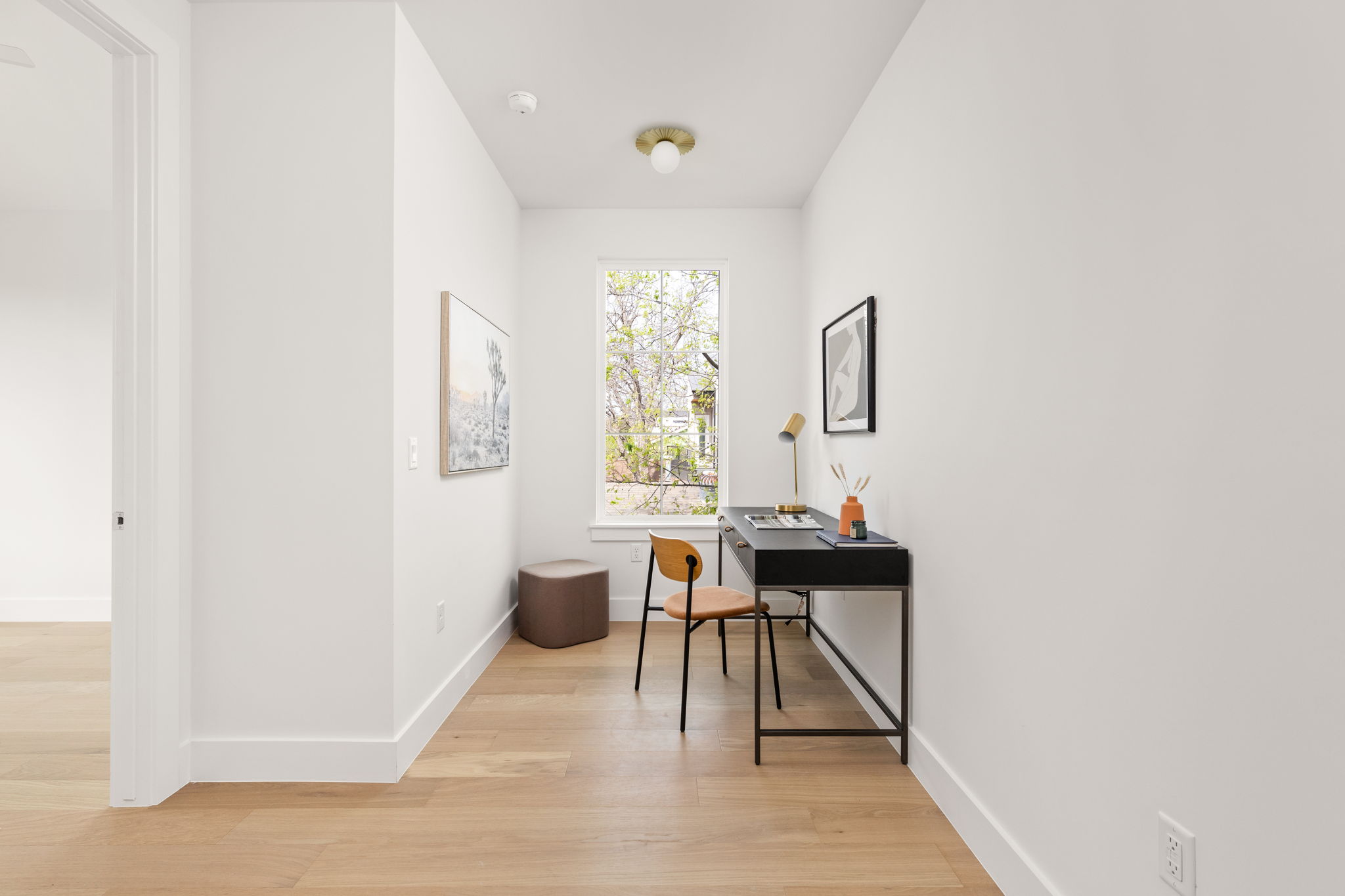 2910 East 4th Street Austin, TX 78702 - Photo 26 of 39 a view of a workspace with furniture and window