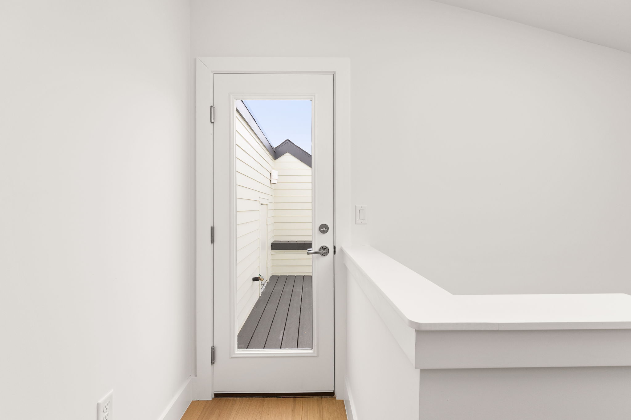 2910 East 4th Street Austin, TX 78702 - Photo 30 of 39 a view of a hallway with staircase
