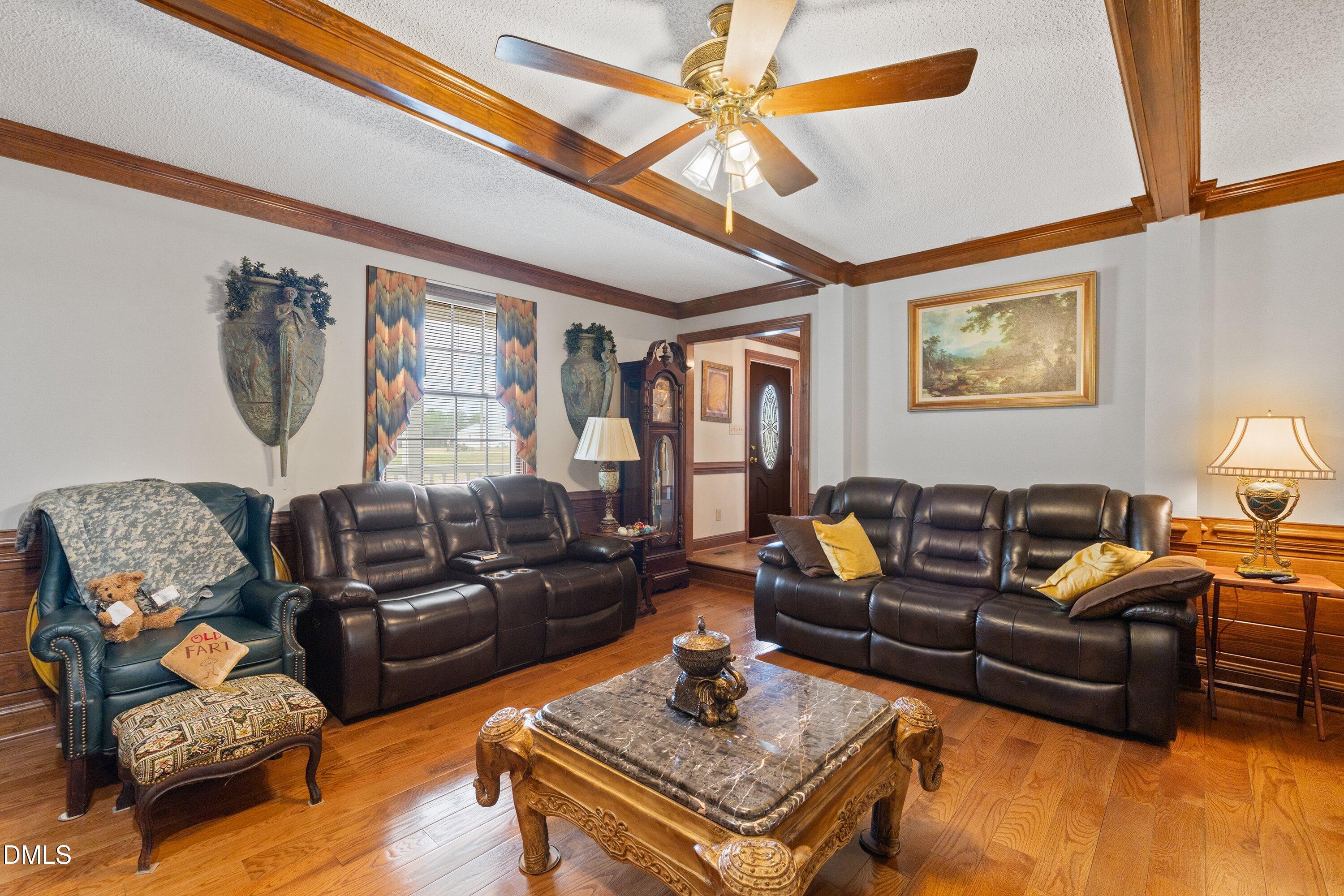 6314 Old Davis Road Sims, NC 27880 - Photo 12 of 71 a living room with furniture and a wooden floor