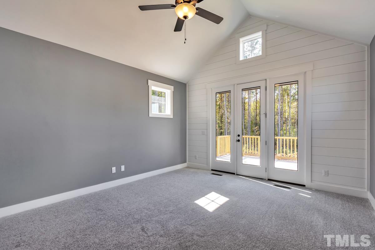 6409 Camellia Creek Drive Raleigh, NC 27603 - Photo 27 of 30 a view of an empty room with a window