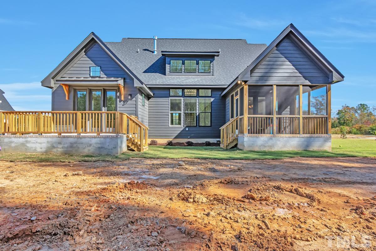 6409 Camellia Creek Drive Raleigh, NC 27603 - Photo 5 of 30 a front view of a house with garden