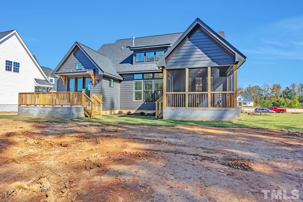 6409 Camellia Creek Drive Raleigh, NC 27603 - Photo 6 of 30 a front view of a house with a yard