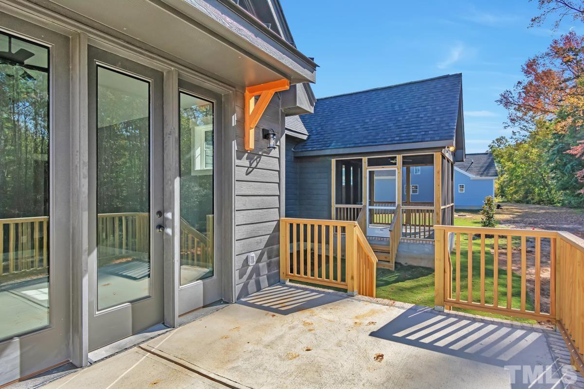 6409 Camellia Creek Drive Raleigh, NC 27603 - Photo 7 of 30 a front view of a house with a porch