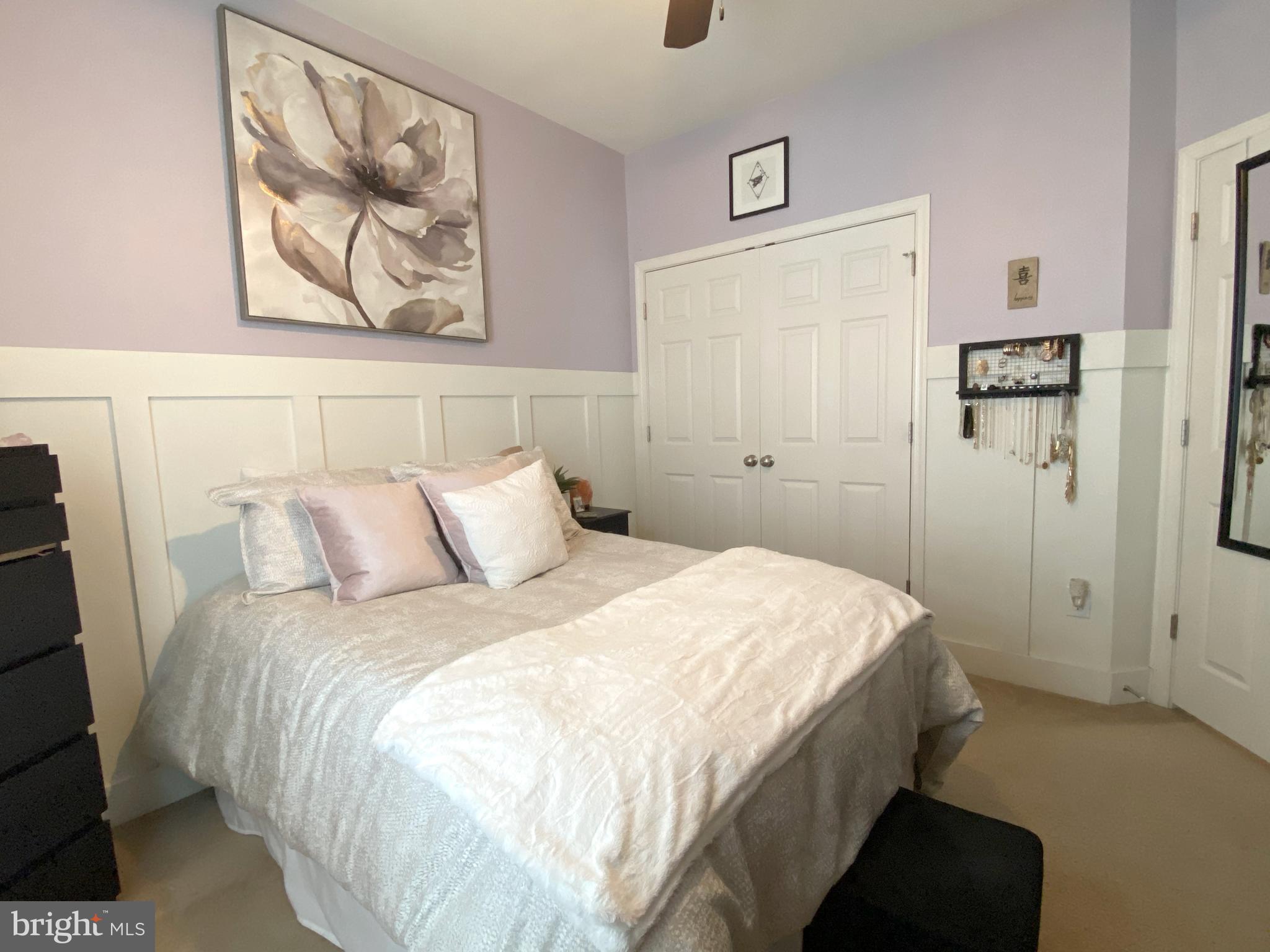 10 Fox Court Riverside, NJ 08075 - Photo 22 of 35 a bedroom with a bed and painting on the wall