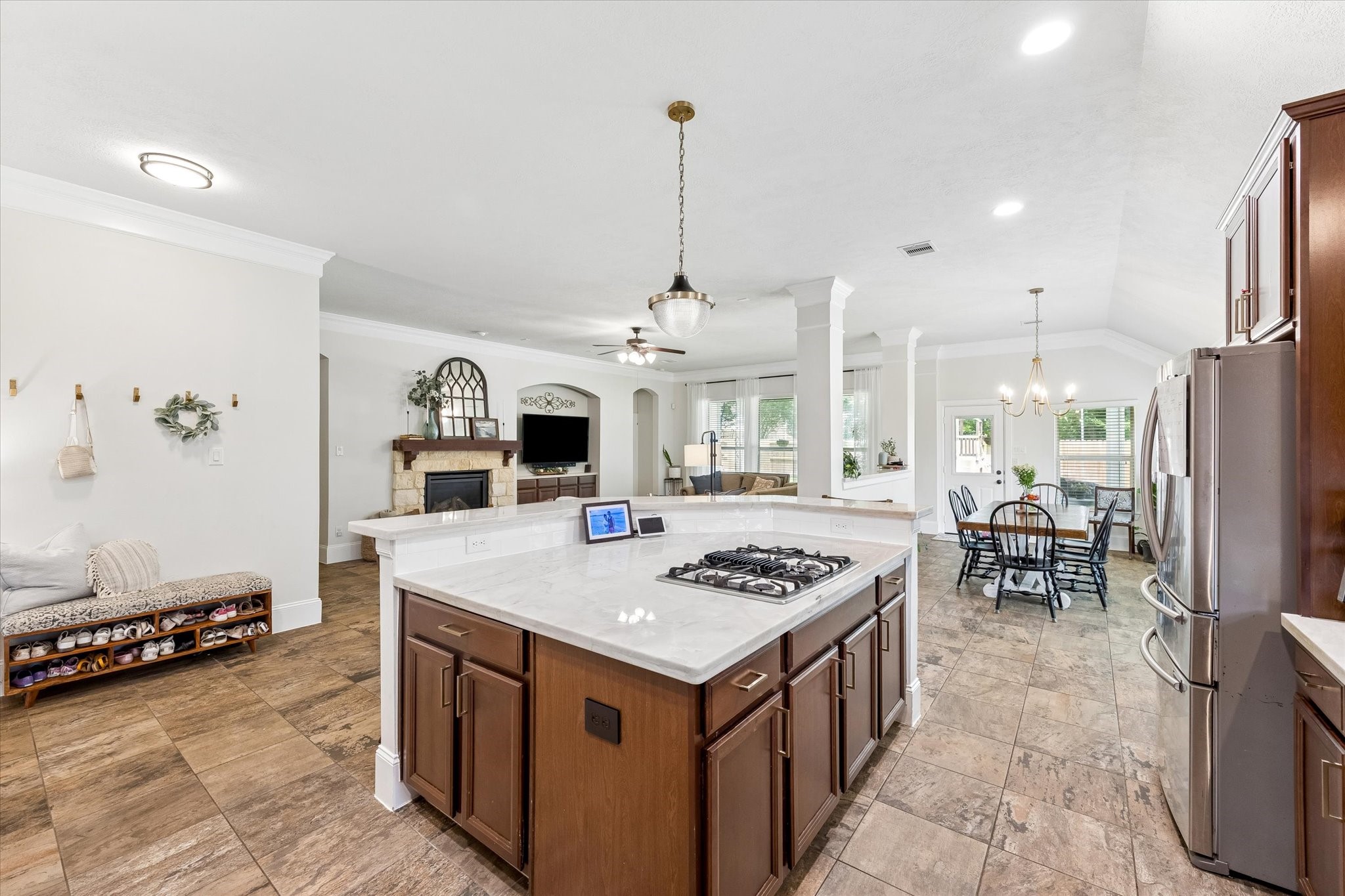 31306 Brighton Brook Lane Spring, TX 77386 - Photo 10 of 34 Expansive island kitchen designed for entertaining and everyday living with seamless connection to the dining and family rooms.