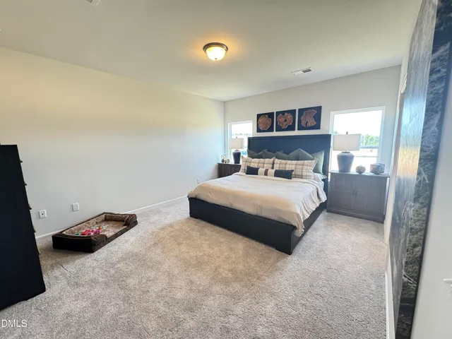 a view of living room with a large window