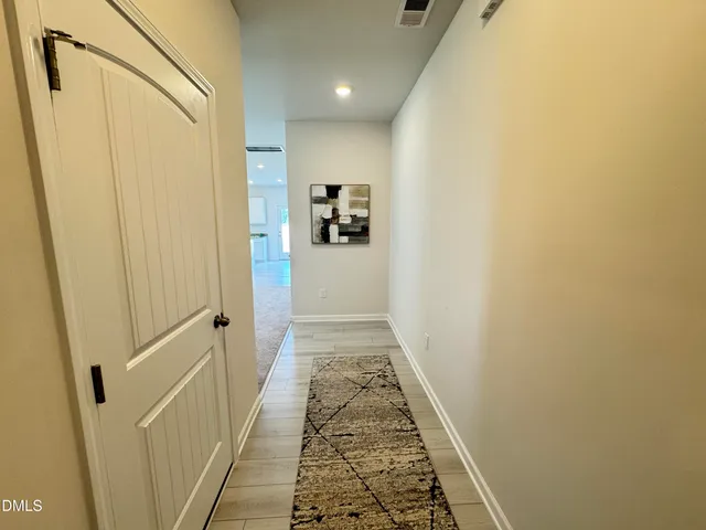 a view of a kitchen with a sink cabinets and a window