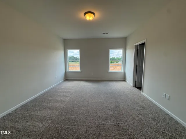 a view of an outdoor space and tennis court