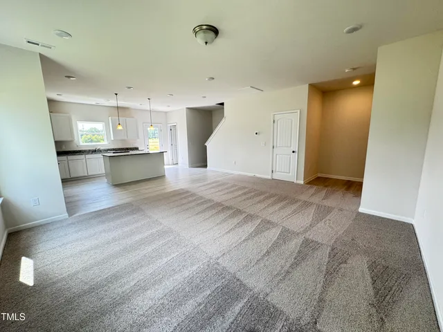 a large kitchen with a lot of counter space